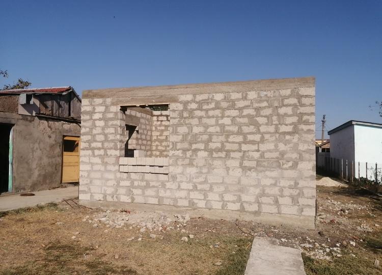 Кладка стен дома из блока